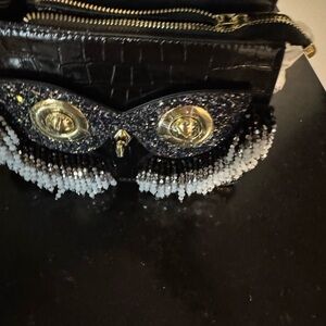Elegant Black and Gold Women's Bag